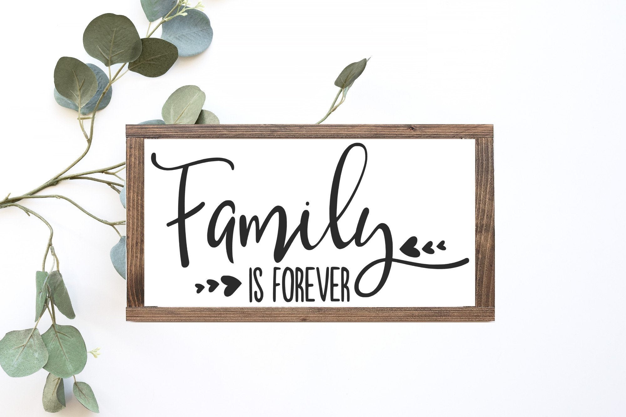 Handcrafted Family Is Forever Wood Sign in matte white finish, showcasing unique wood grain and lettering.