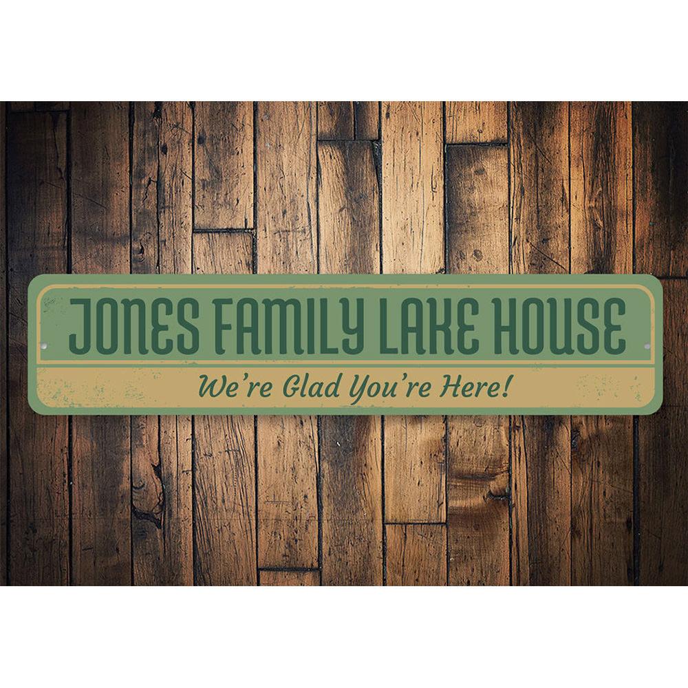 A beautifully crafted Family Lake House Sign made of durable aluminum, featuring customizable text and a rustic design, perfect for lake house decor.