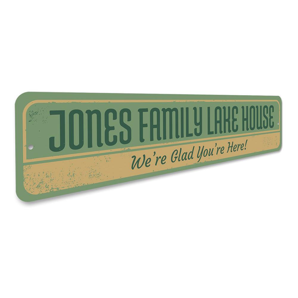 A beautifully crafted Family Lake House Sign made of durable aluminum, featuring customizable text and a rustic design, perfect for lake house decor.