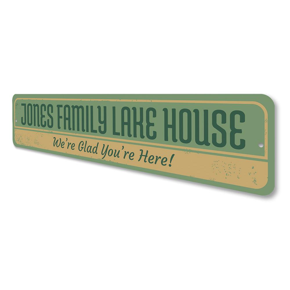 A beautifully crafted Family Lake House Sign made of durable aluminum, featuring customizable text and a rustic design, perfect for lake house decor.