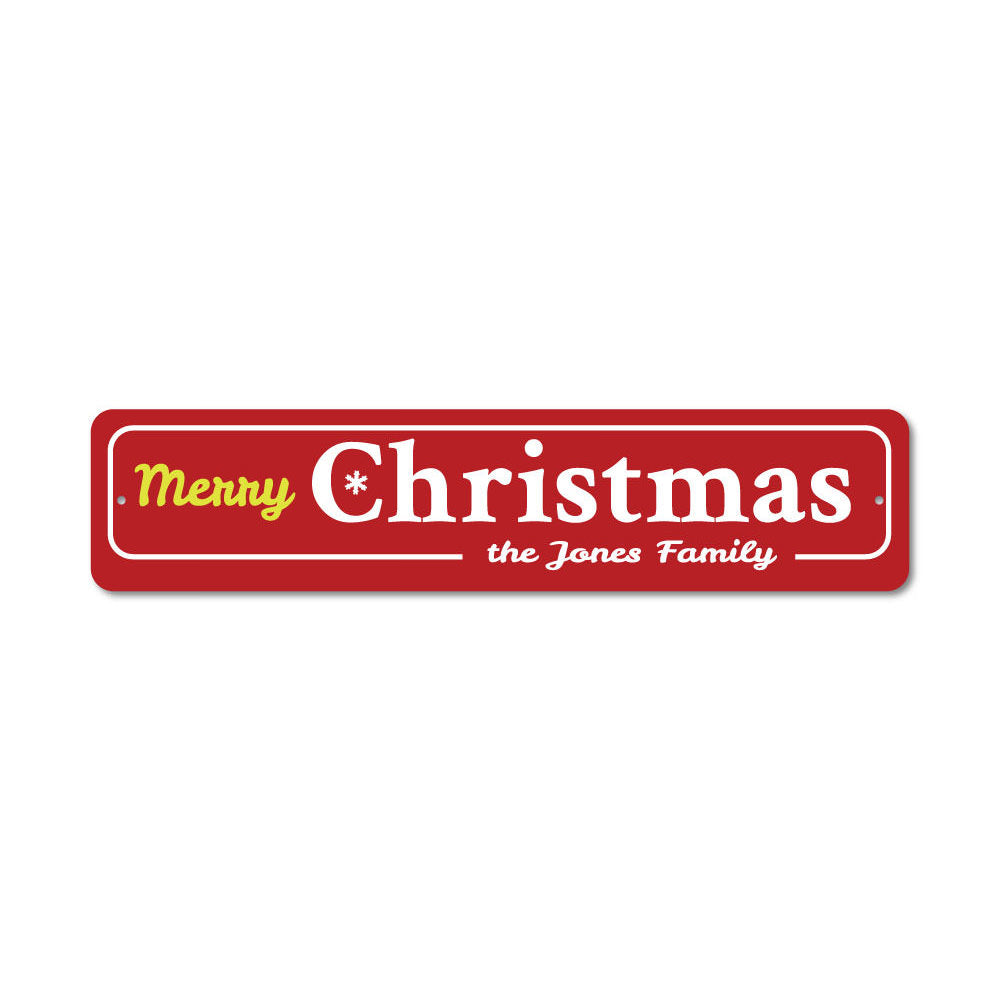 A decorative Family Merry Christmas Snowflake Sign featuring a festive snowflake design, perfect for holiday decor.