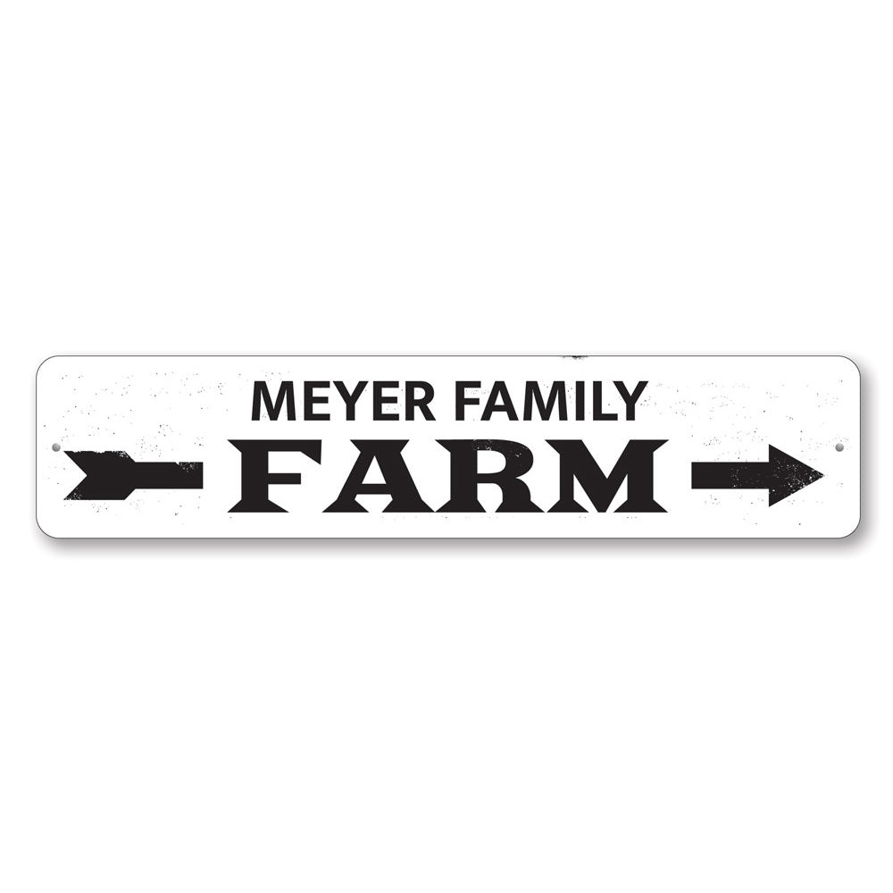 A decorative Family Name Farm Arrow Sign made of high-quality aluminum, featuring customizable text and a rustic design, perfect for home decor.