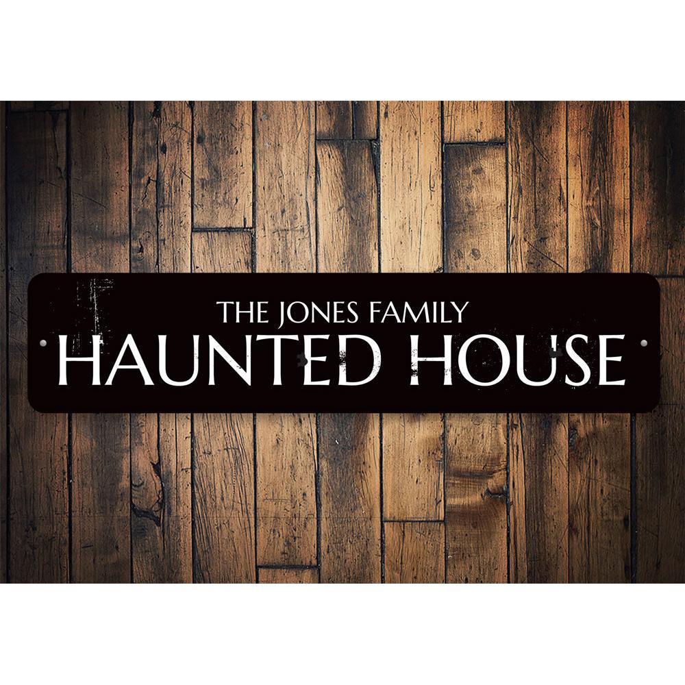 A personalized Family Name Haunted House Sign made of high-quality aluminum, featuring spooky design elements perfect for Halloween decor.