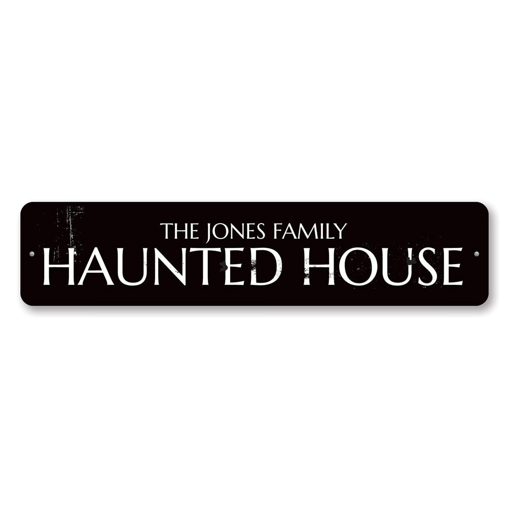 A personalized Family Name Haunted House Sign made of high-quality aluminum, featuring spooky design elements perfect for Halloween decor.