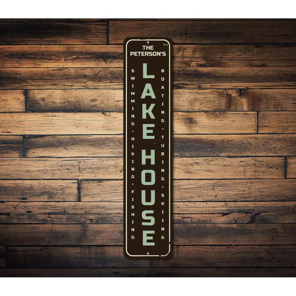 A personalized Family Name Lake House Vertical Sign made of high-quality aluminum, featuring customizable text and a rustic design, perfect for lake house decor.