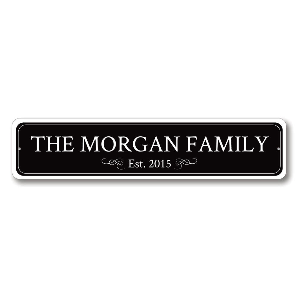 A personalized Family Name Sign made of high-quality aluminum, featuring custom text and pre-drilled holes for easy mounting.