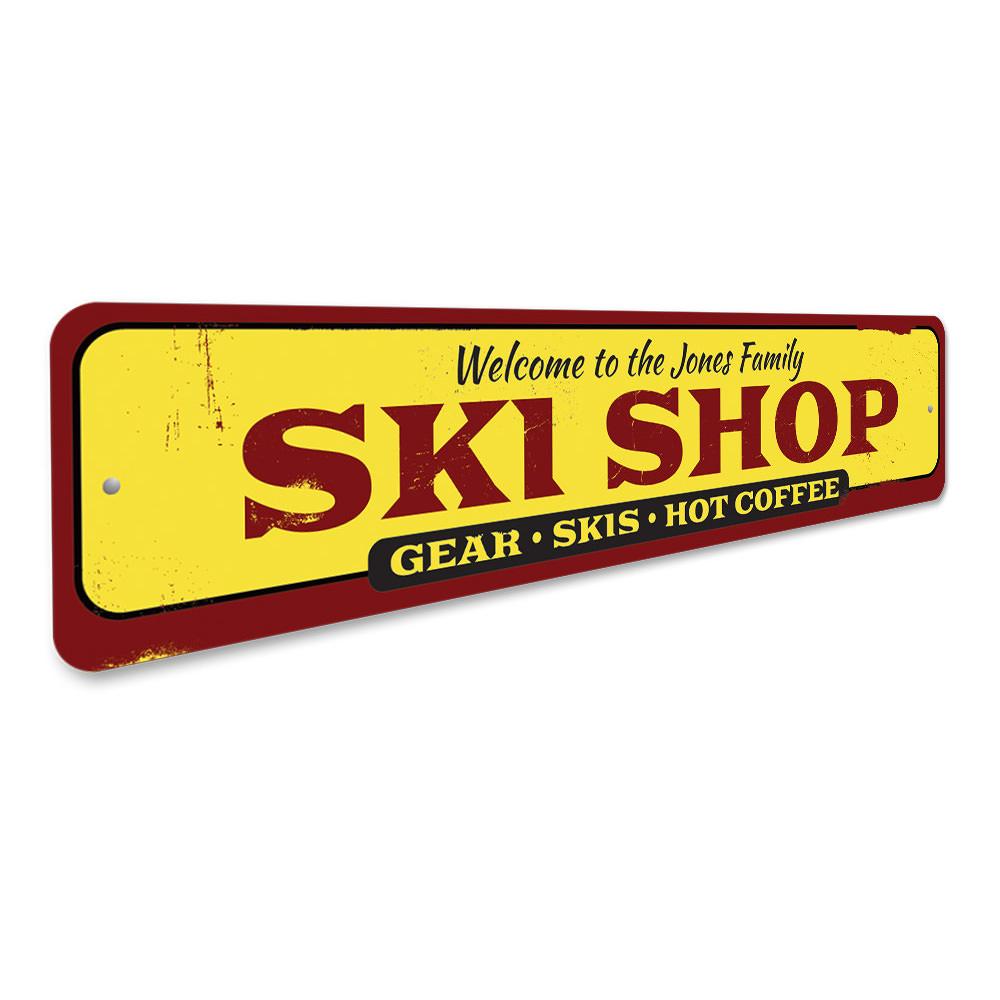 A decorative Family Ski Shop Sign made of high-quality aluminum, featuring customizable text and pre-drilled holes for easy mounting.