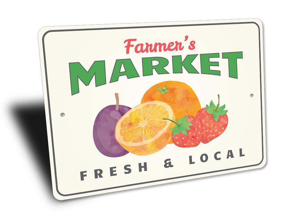 A decorative Farmer's Market Fruit Sign made of aluminum, featuring vibrant fruit graphics, perfect for home decor.