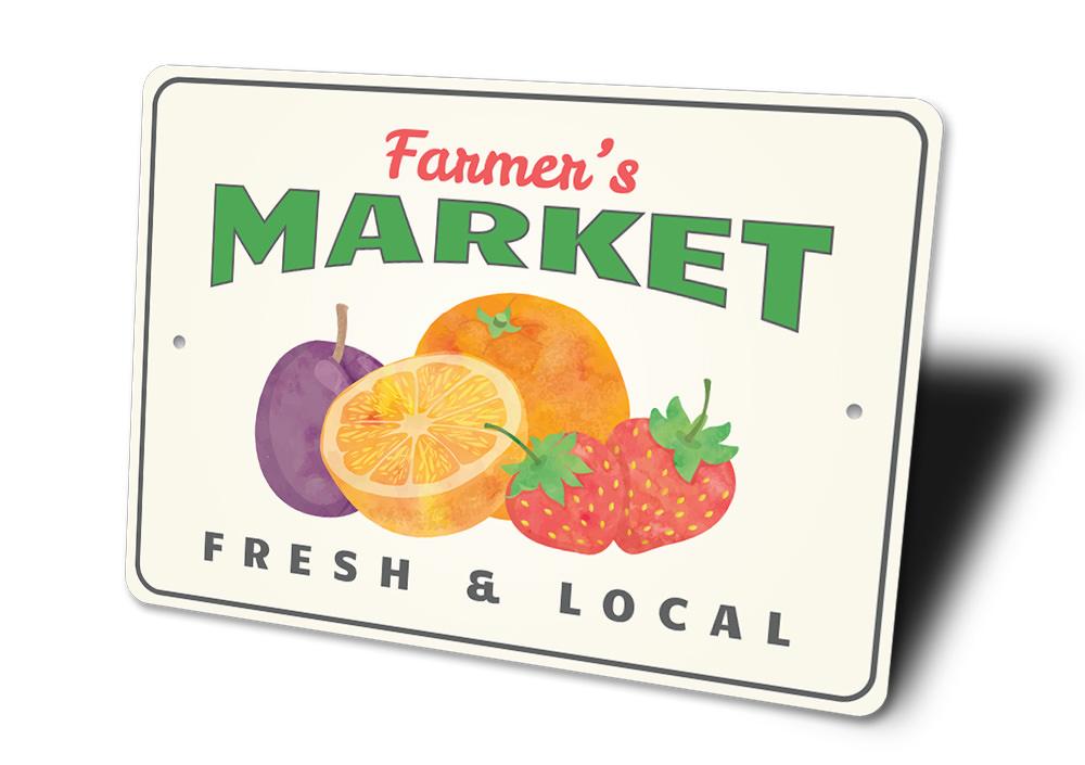 A decorative Farmer's Market Fruit Sign made of aluminum, featuring vibrant fruit graphics, perfect for home decor.