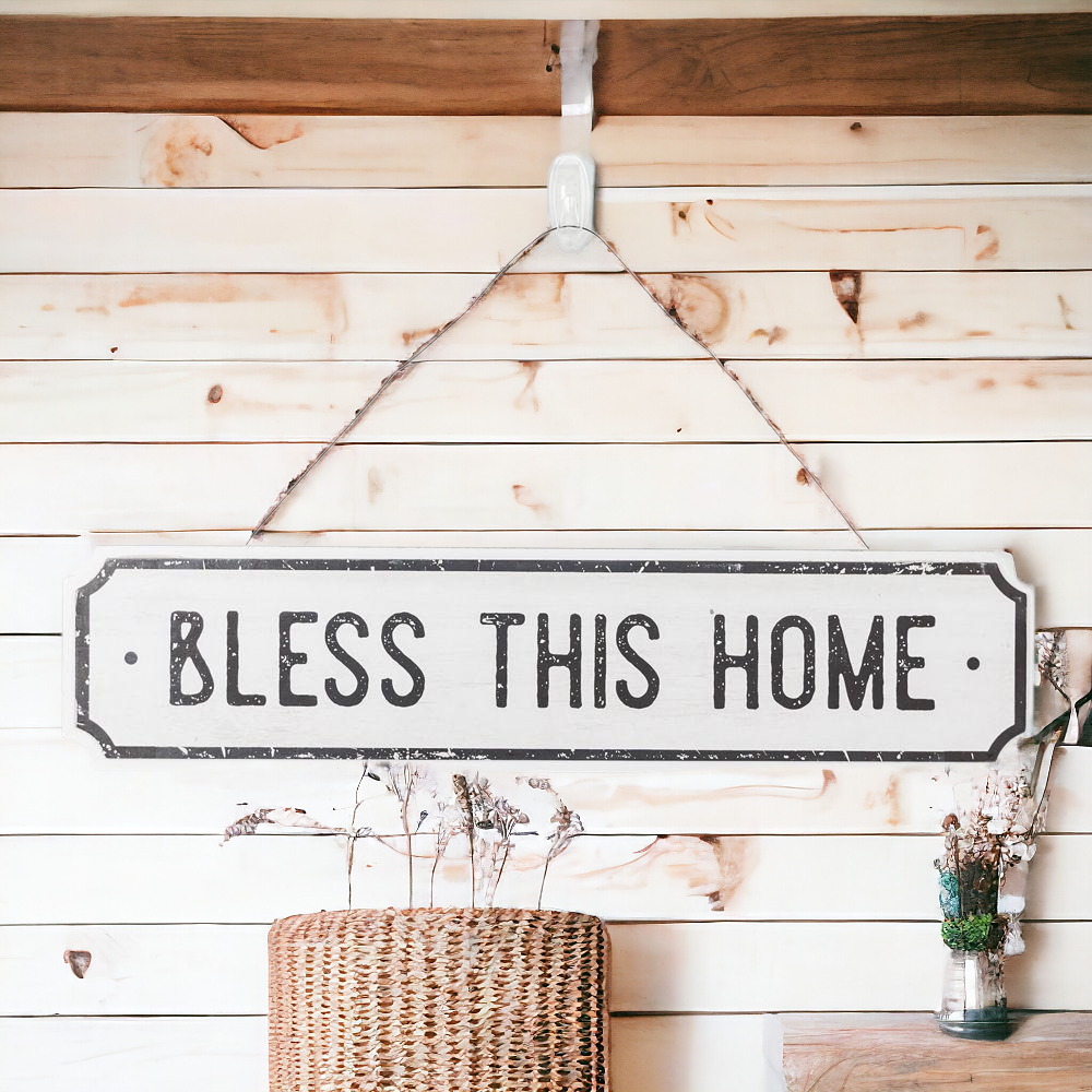 Farmhouse Chic hanging wood sign with 'Bless This Home' and 'Eat Good Food' messages, featuring a rustic white and black design.