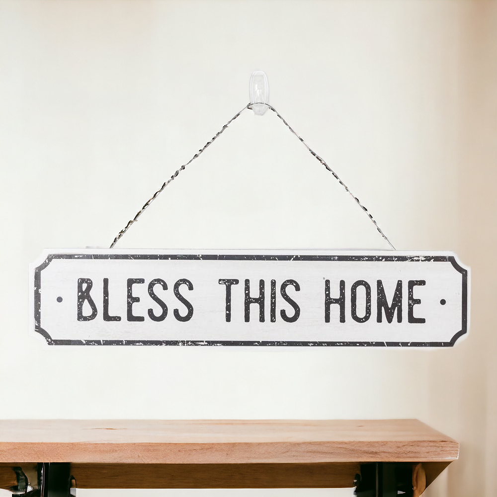 Farmhouse Chic hanging wood sign with 'Bless This Home' and 'Eat Good Food' messages, featuring a rustic white and black design.