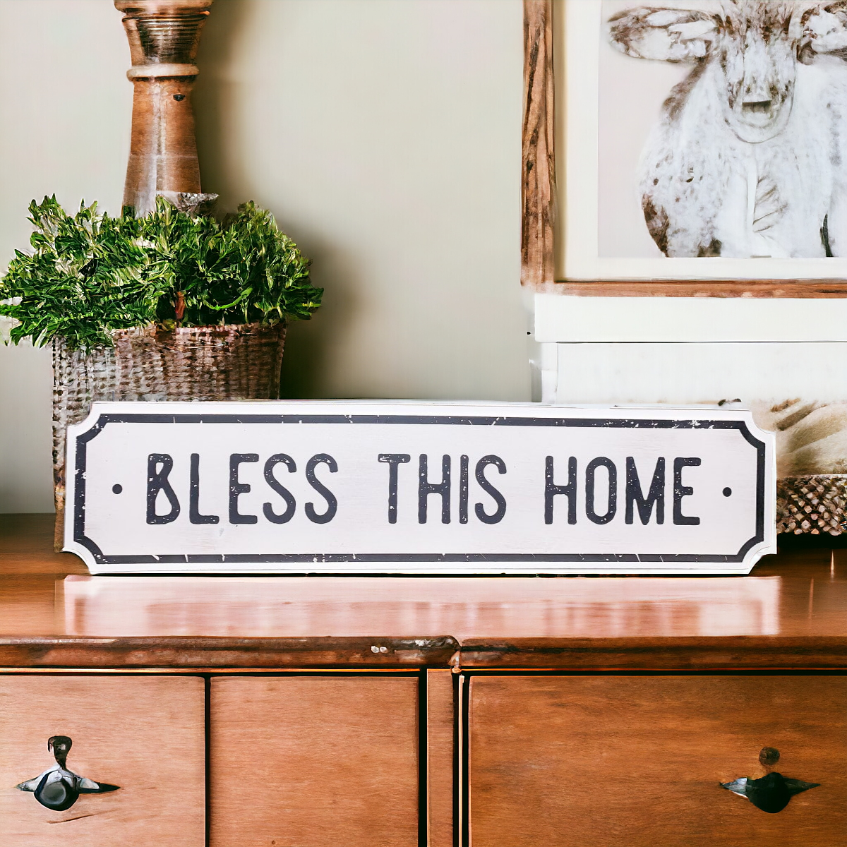 Farmhouse Chic hanging wood sign with 'Bless This Home' and 'Eat Good Food' messages, featuring a rustic white and black design.