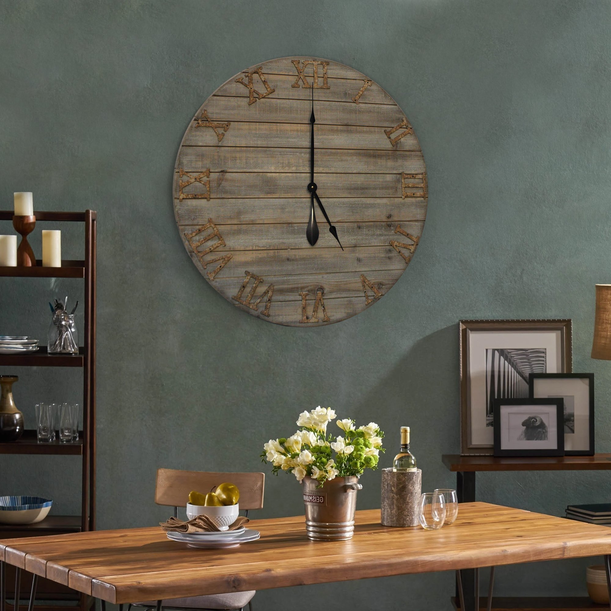 A 30-inch oversized farmhouse wall clock made of real wood with cast iron numbers, showcasing a beautifully distressed finish.