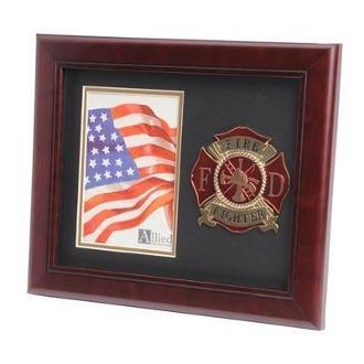 Elegant firefighter medallion portrait picture frame with double layer black matting and gold trim, showcasing a 4x6 inch photo.