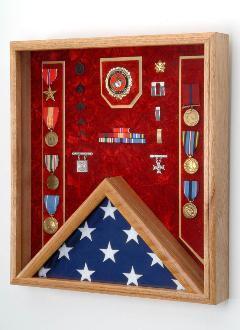 Fireman Flag and Medal Display Case Shadow Box in oak finish, showcasing medals and a folded flag against a crushed velvet background.