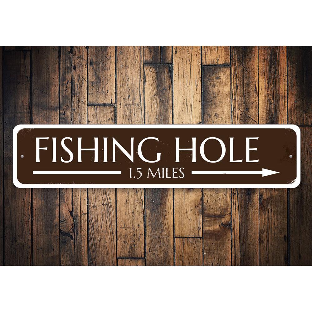 Fishing Hole Arrow Sign made of durable aluminum, featuring customizable text and pre-drilled holes for easy mounting, perfect for lakehouses.