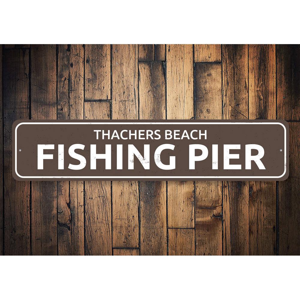 A beautifully crafted Fishing Pier Sign made of durable aluminum, featuring customizable text, perfect for lakehouse decor.