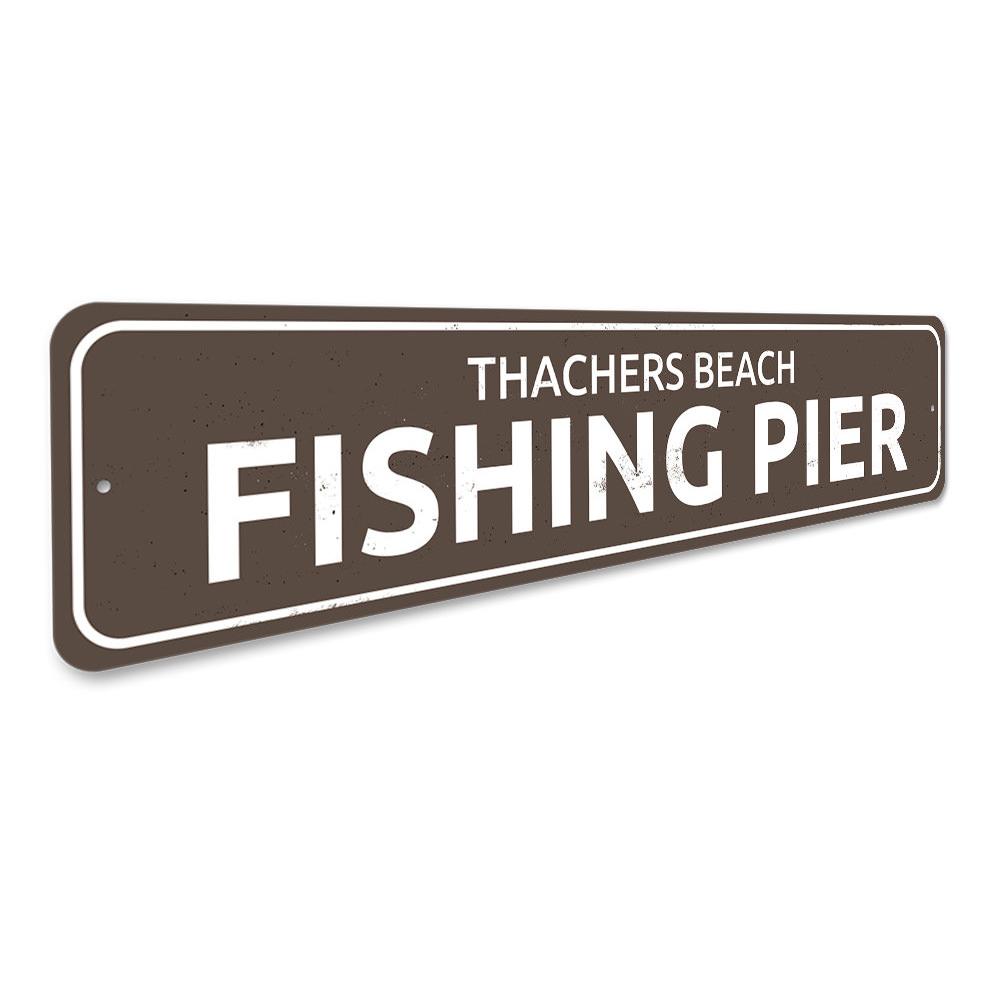 A beautifully crafted Fishing Pier Sign made of durable aluminum, featuring customizable text, perfect for lakehouse decor.