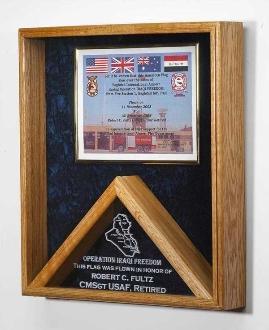 Elegant oak flag and certificate display case showcasing military medals and awards.