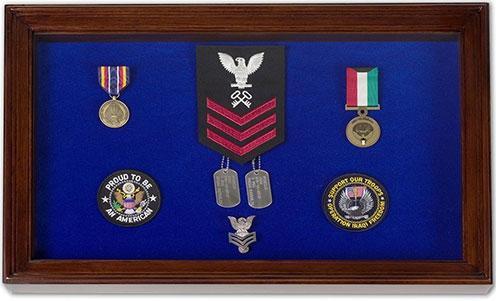 Large blue military award shadow box display case made of solid mahogany with felt backing.