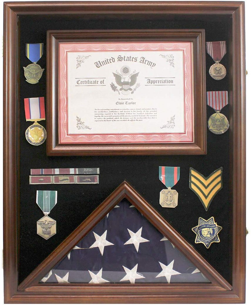 Solid wood flag display case with triangle design, showcasing a folded 3'X5' flag, medals, and a certificate frame.