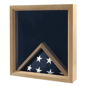 Elegant oak military flag display case showcasing medals and a folded flag, lined with black felt.