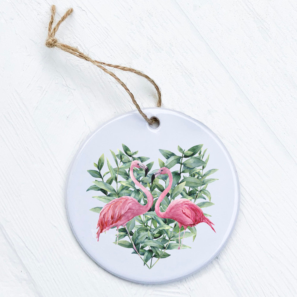 A beautifully crafted Flamingo Heart Ornament made of high-quality porcelain, featuring a vibrant design with a smooth gloss finish.