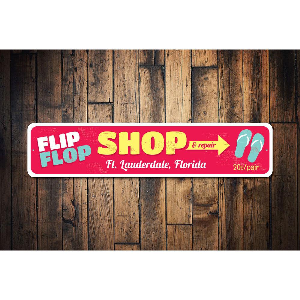 A colorful Flip Flop Sign made of aluminum, featuring a beach-themed design, perfect for coastal decor.