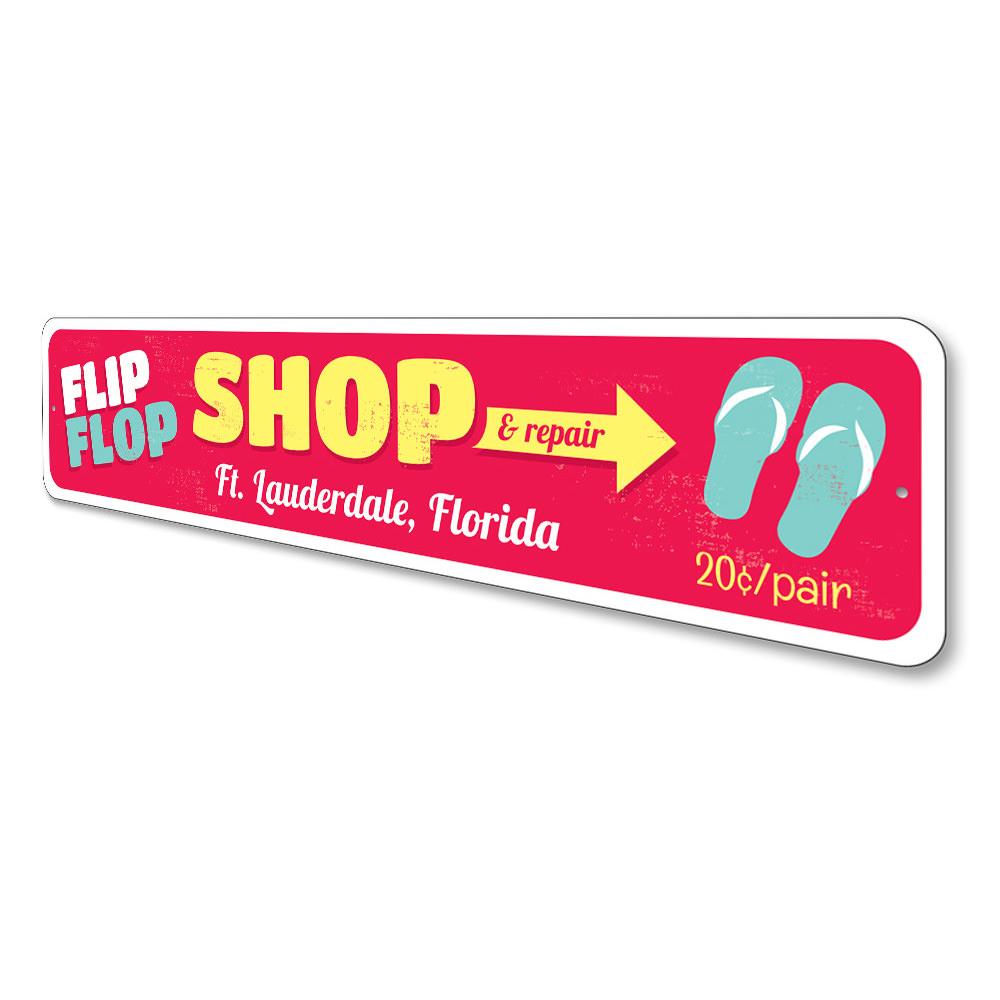 A colorful Flip Flop Sign made of aluminum, featuring a beach-themed design, perfect for coastal decor.