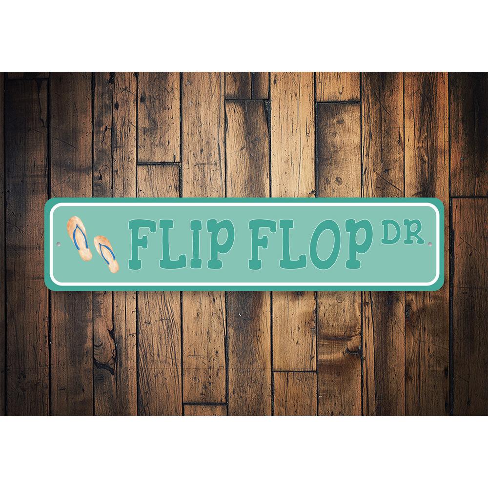 Colorful Flip Flop Street Sign made of durable aluminum, featuring a fun design perfect for beach-themed decor.