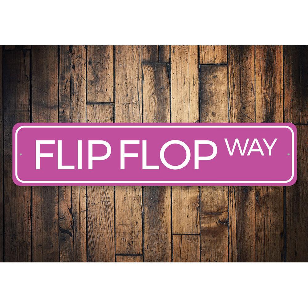 A colorful Flip Flop Way Sign made of aluminum, featuring a beach-themed design perfect for coastal decor.