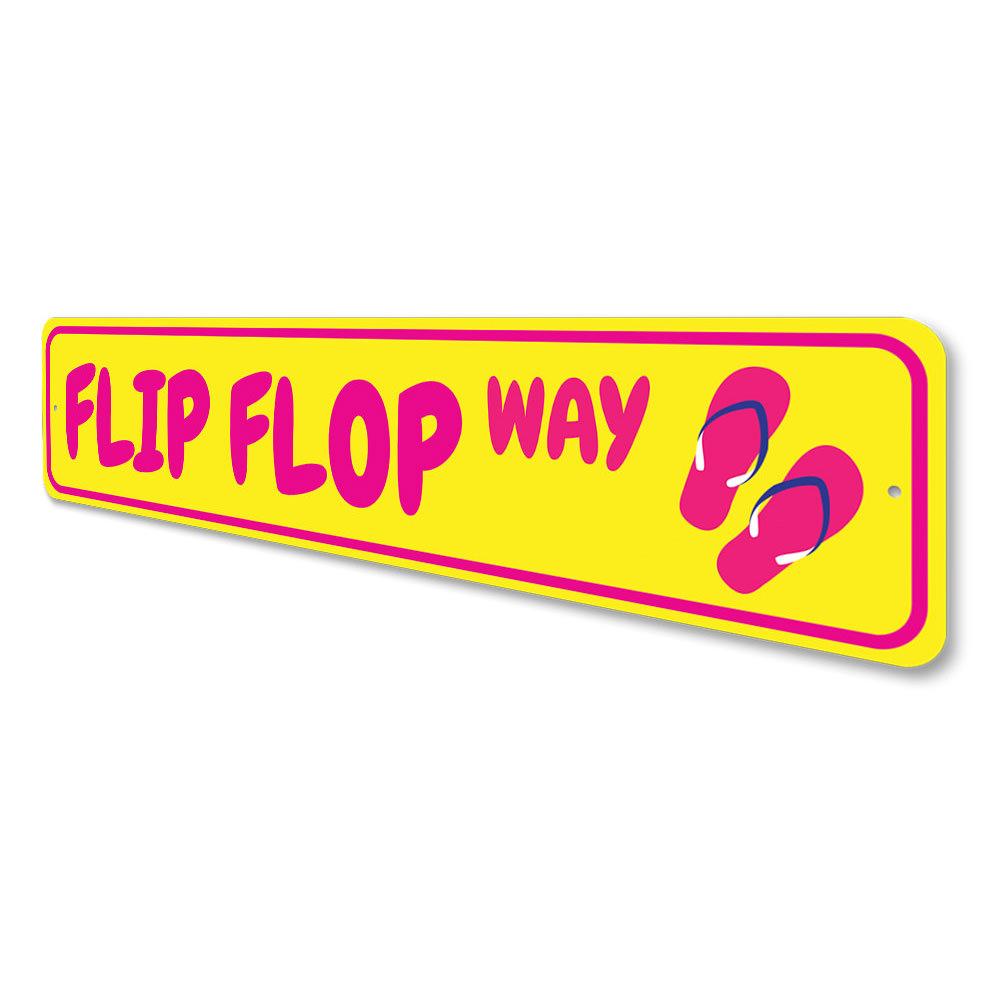 A colorful Flip Flop Way Sign made of aluminum, featuring vibrant beach-themed graphics, perfect for coastal decor.