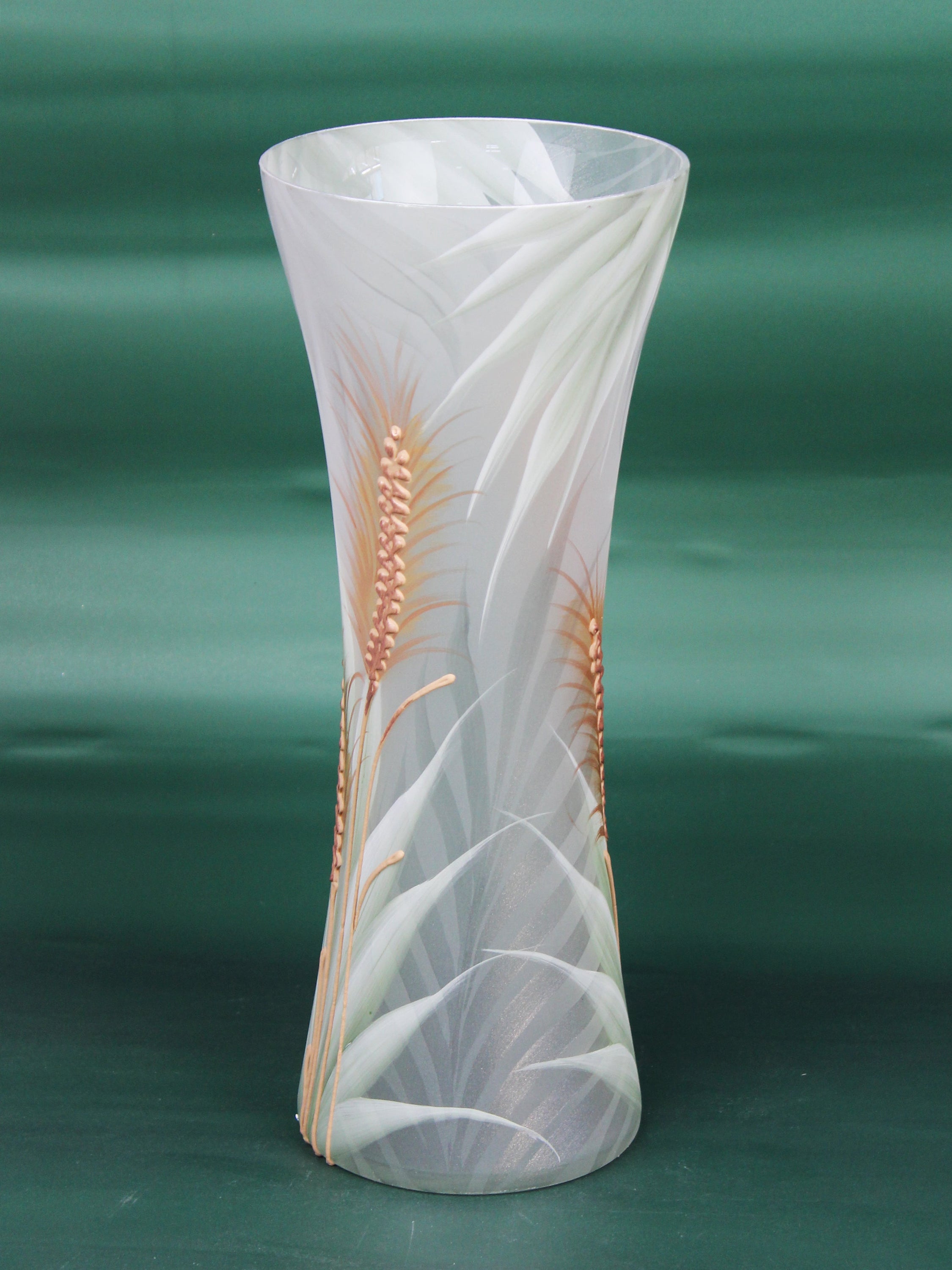 A beautifully hand-painted light green decorative glass vase with unique artistic designs, showcasing its elegant shape and vibrant colors.