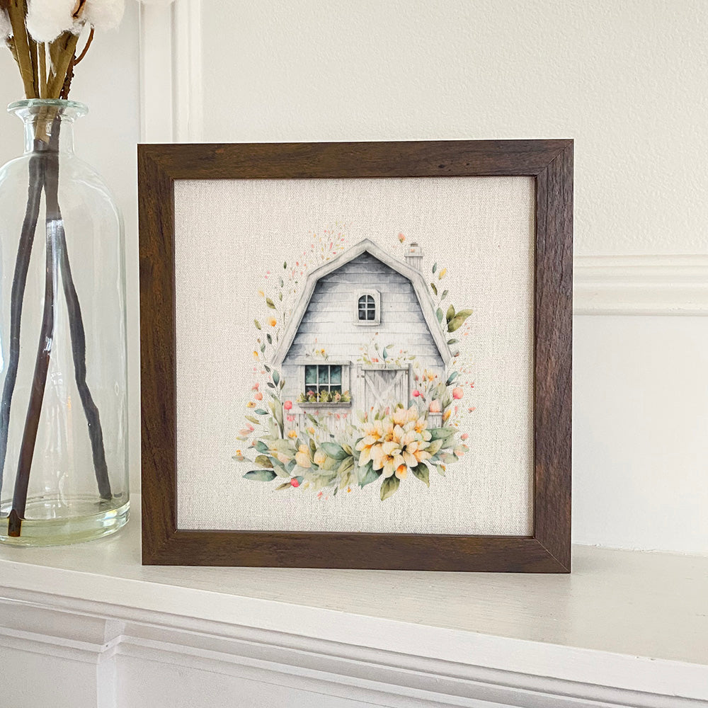 Floral Barn Framed Sign with a stylized wood frame, eco-friendly printing on a linen-look background, available in walnut and white-washed finishes.