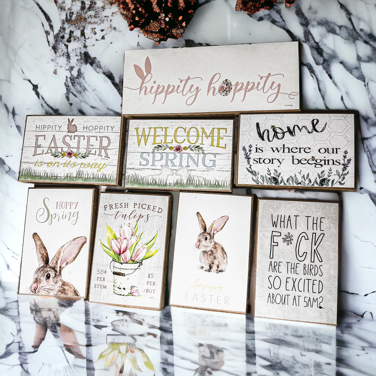 Two wooden block signs for Easter and Spring decor featuring a watercolor bunny and Hippity Hoppity design, perfect for festive displays.