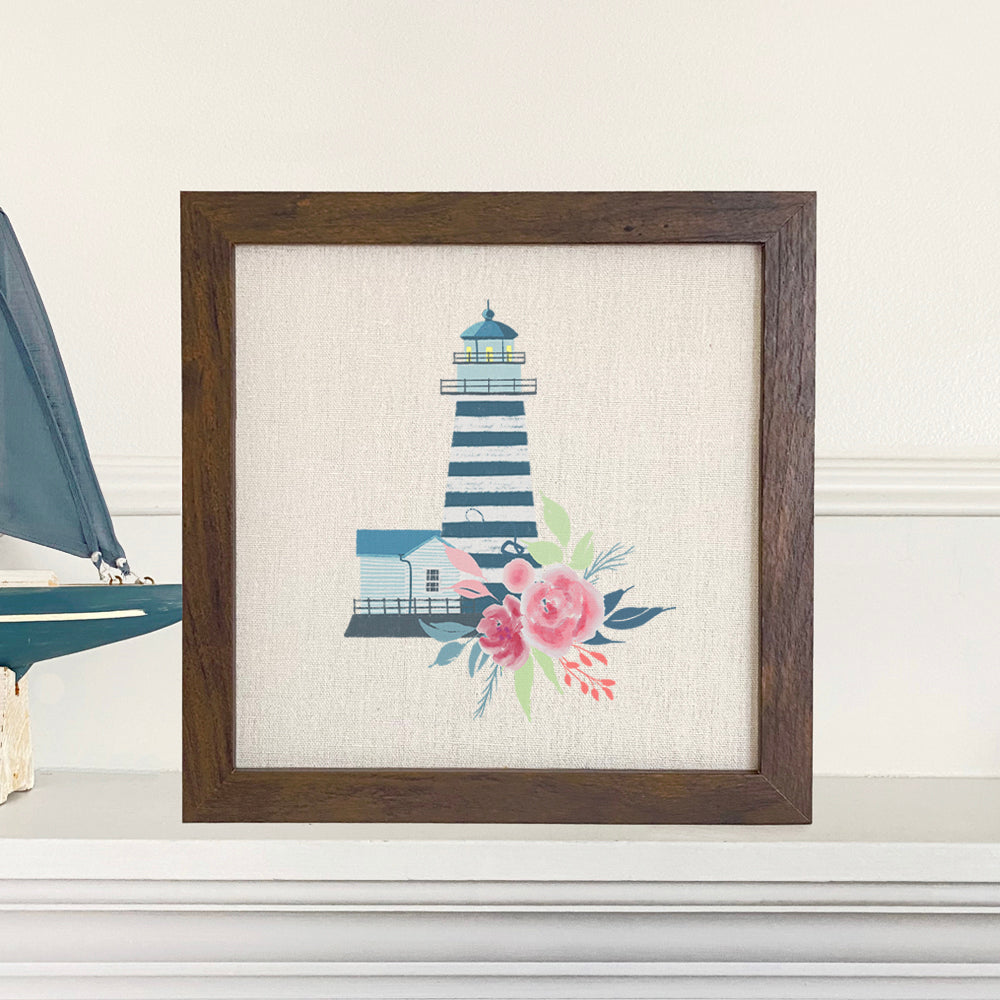 Floral Striped Lighthouse framed sign with a wood frame and linen-look background, showcasing vibrant floral designs.