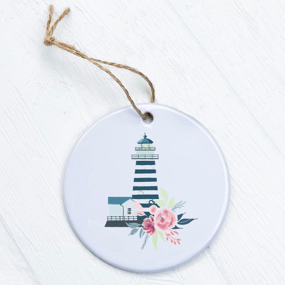 Floral Striped Lighthouse ornament made of high-quality porcelain with vibrant colors and a smooth finish, measuring 2.75 inches in diameter.