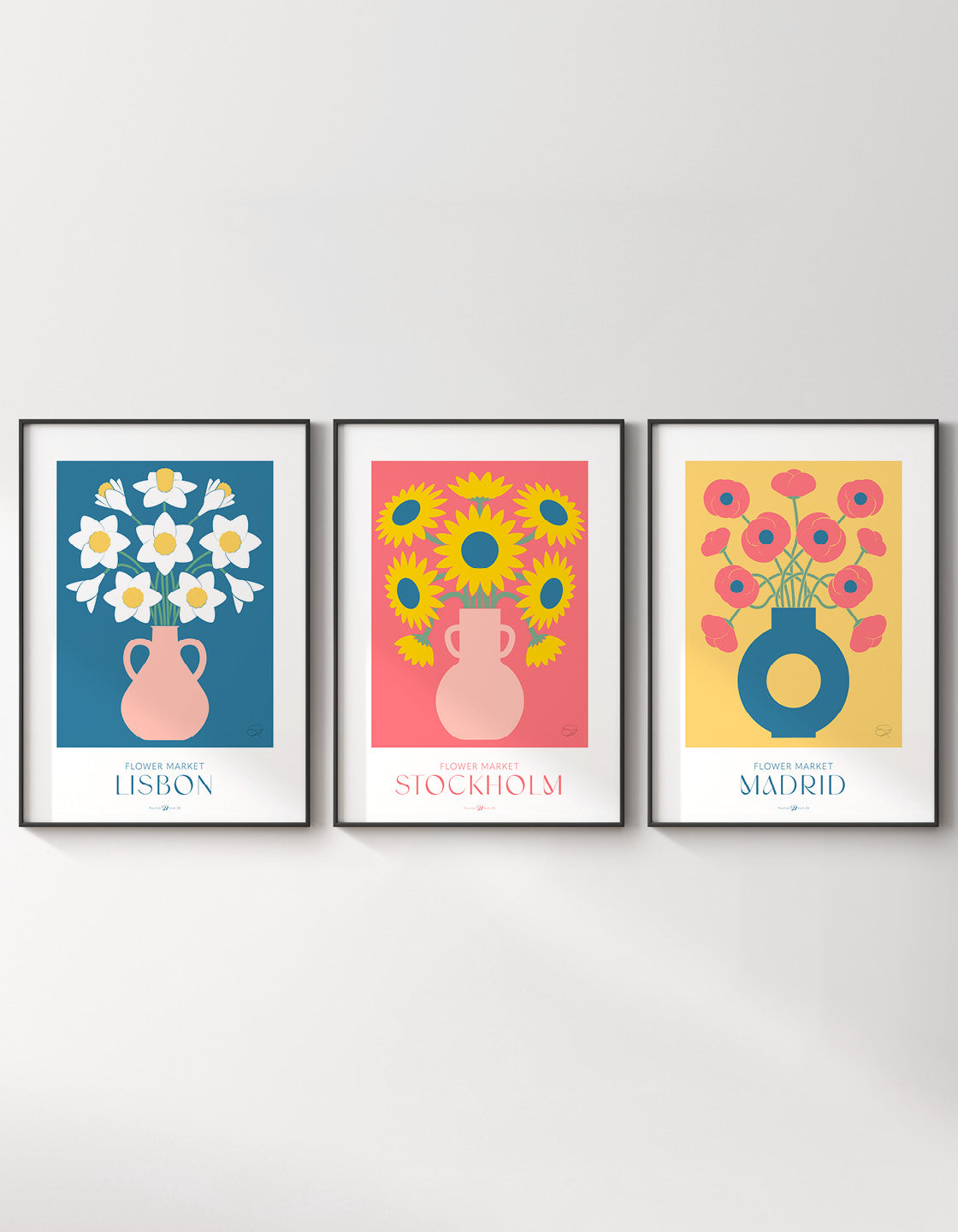 A colorful gallery wall featuring three flower market prints: daffodils, sunflowers, and poppies, each with customizable destination backgrounds.