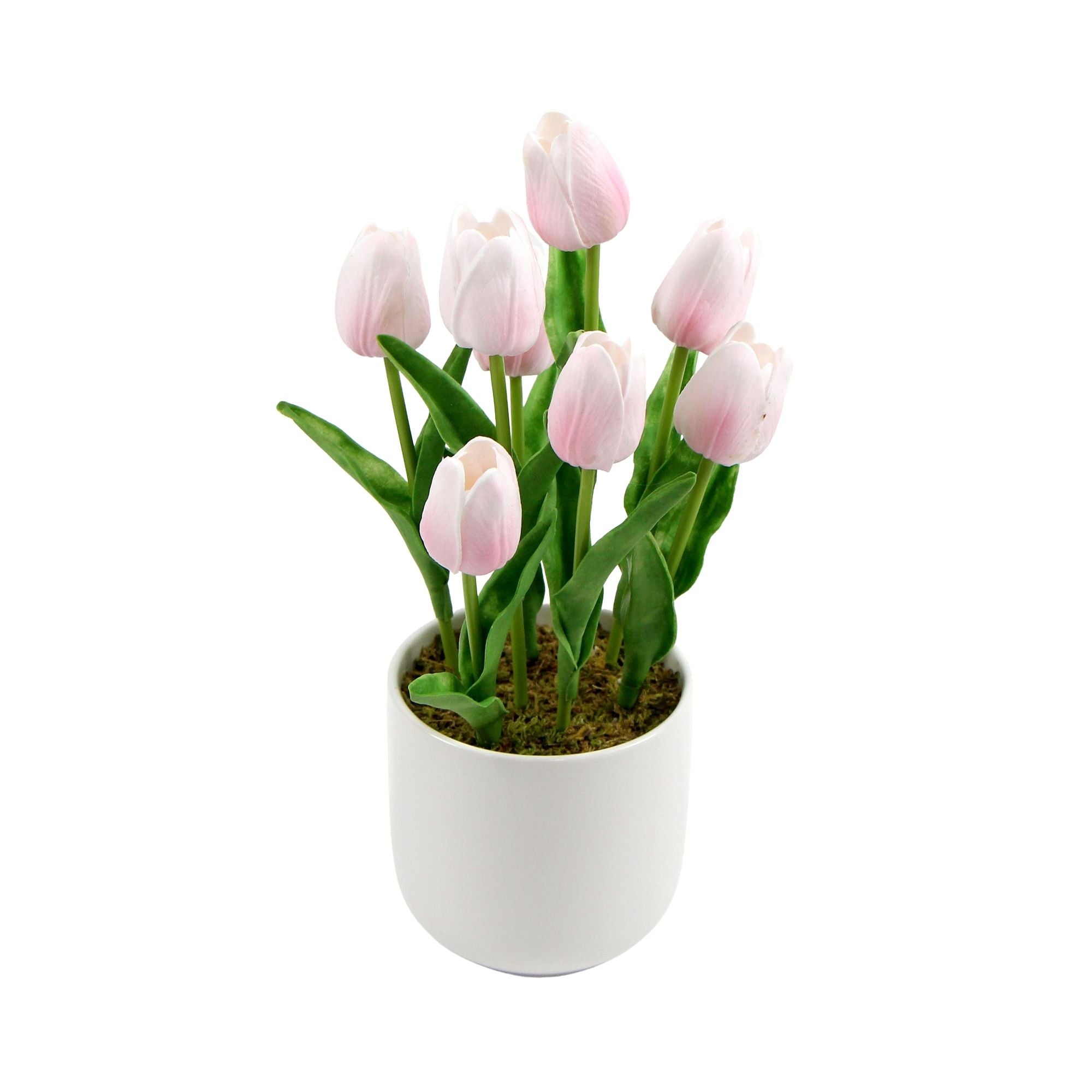 A vibrant arrangement of pink artificial tulips in a modern ceramic bowl, showcasing lush green foliage.