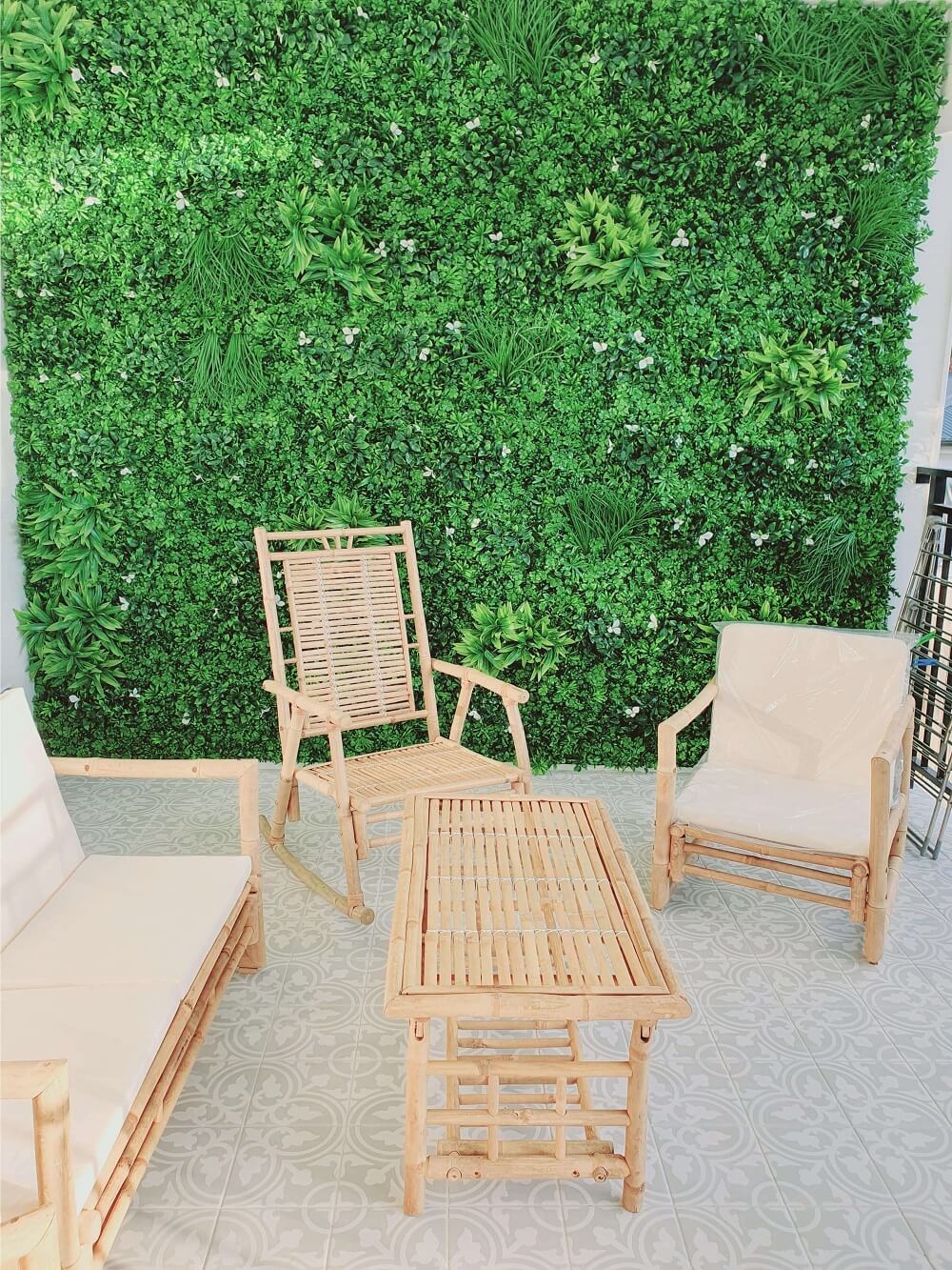 A vibrant Flowering White Jasmine Fake Green Wall showcasing lush greenery and white flowers, perfect for indoor and outdoor decor.