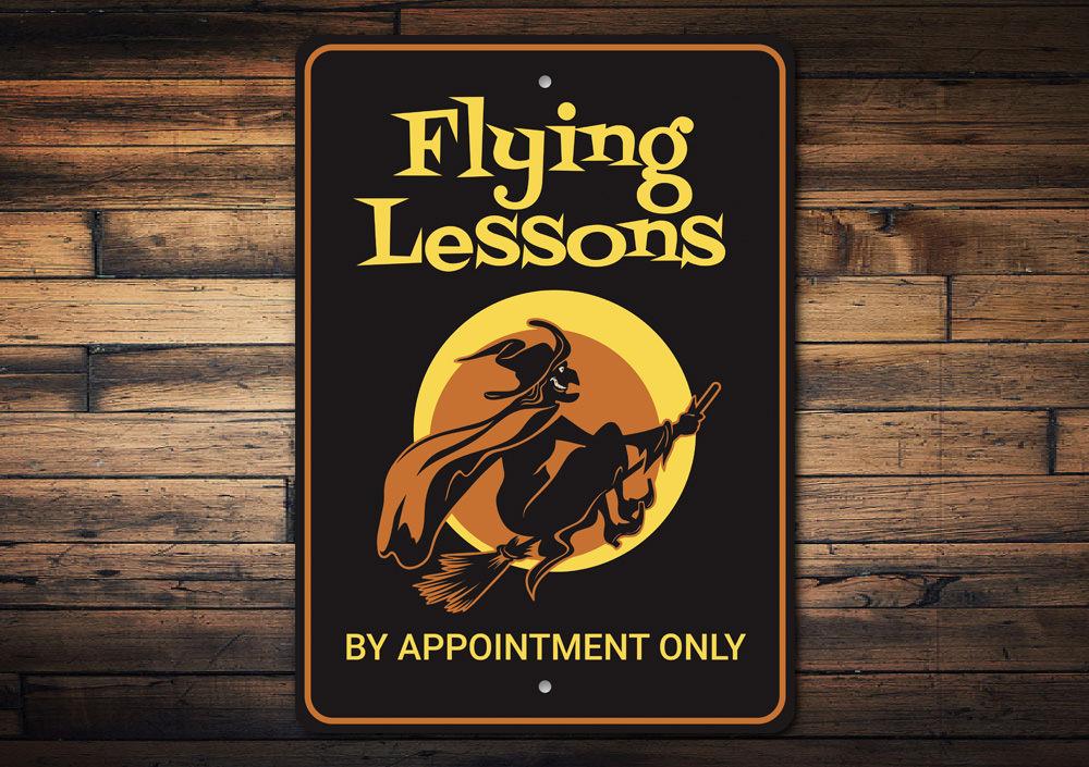 Flying Lessons Witch Sign featuring spooky Halloween design, made from high-quality aluminum with pre-drilled holes for easy mounting.