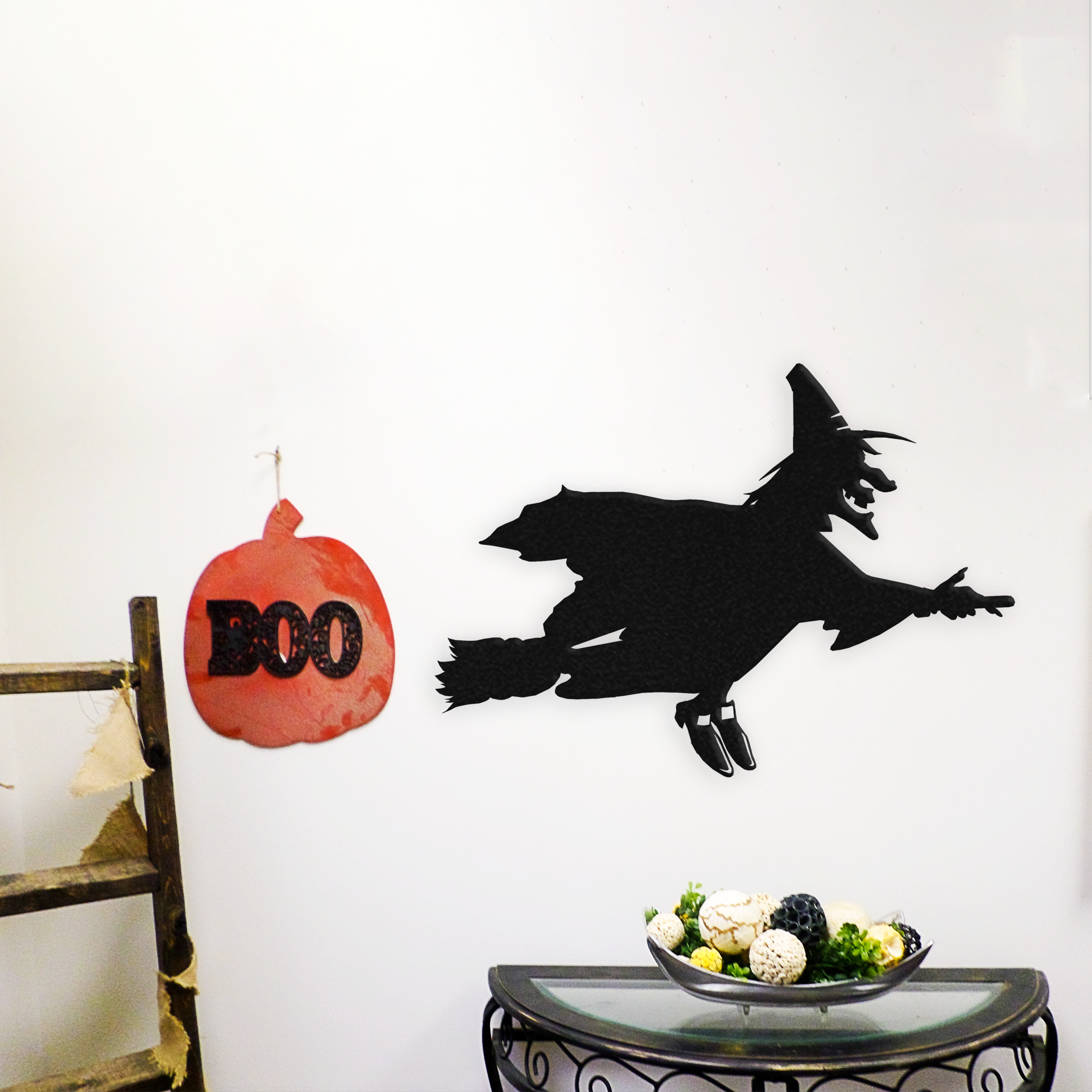 Flying Witch metal wall art, featuring intricate design and a low gloss finish, perfect for Halloween decoration.