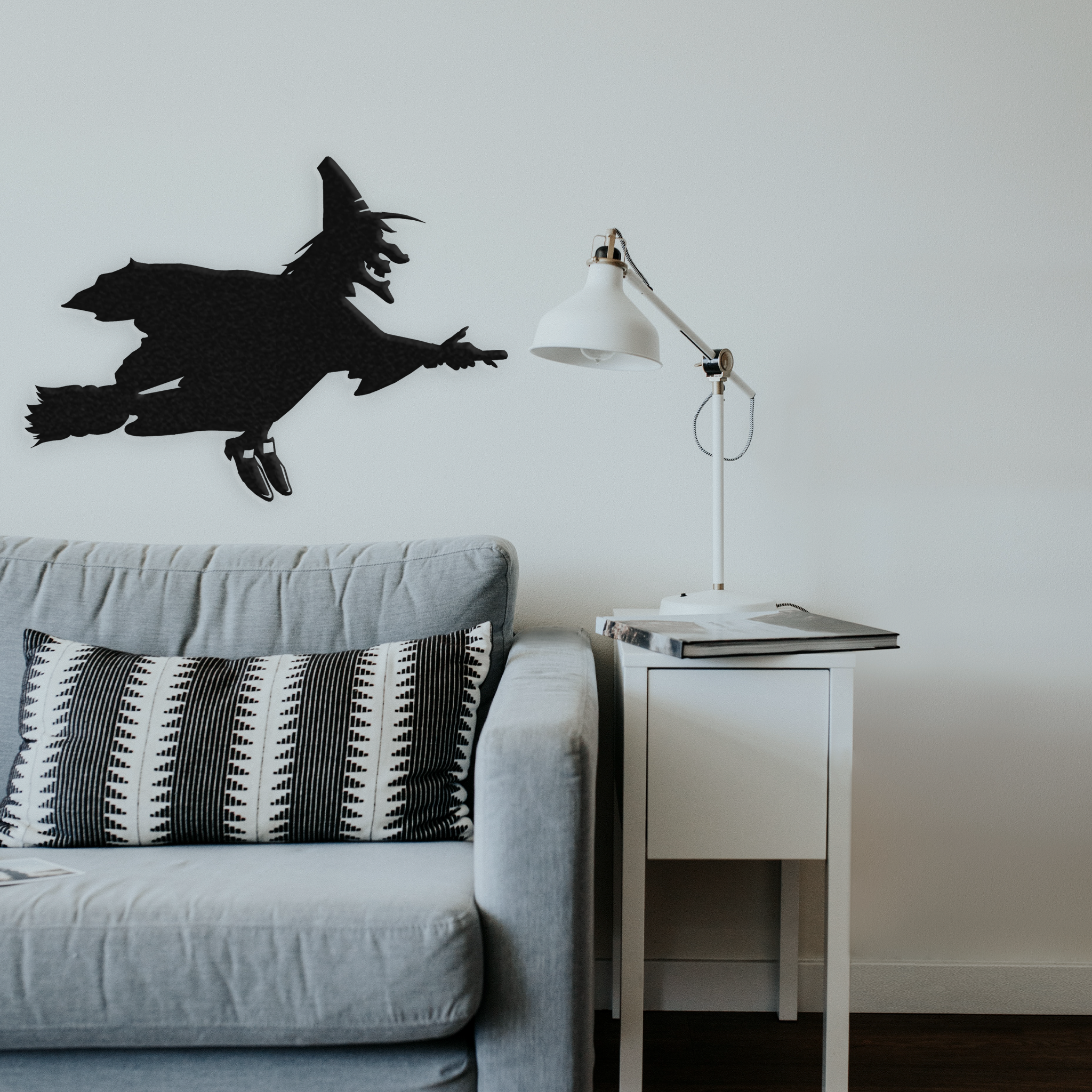 Flying Witch metal wall art, featuring intricate design and a low gloss finish, perfect for Halloween decoration.