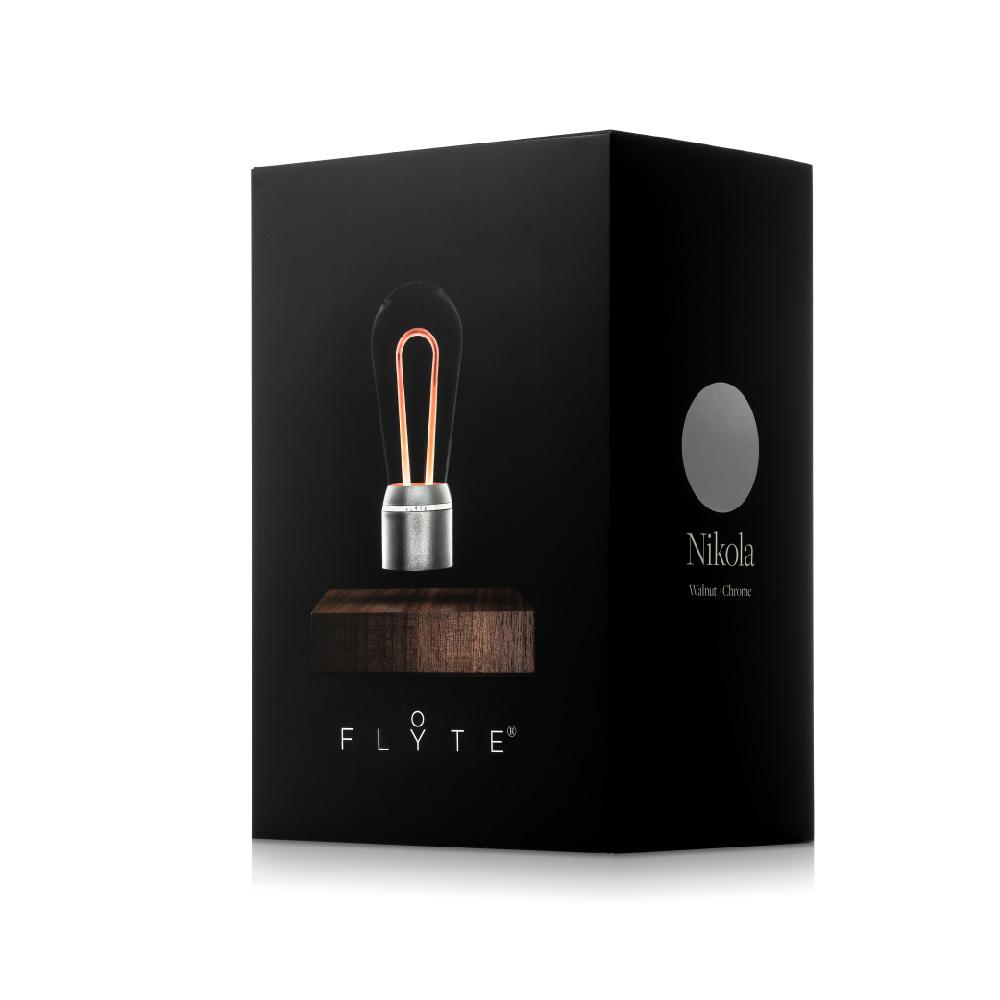 FLYTE Nikola levitating light bulb with Walnut base and Chrome Marconi bulb, showcasing innovative design and energy efficiency.