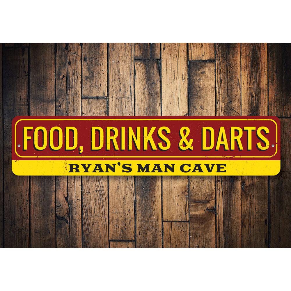 A decorative Food Drinks and Darts Sign made of high-quality aluminum, featuring vibrant colors and customizable text, perfect for game rooms and man caves.