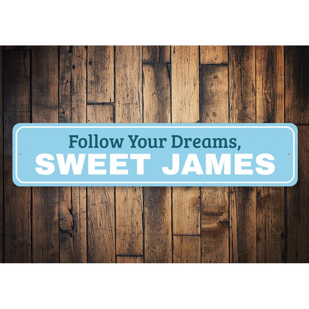 A decorative Follow Your Dreams Sign made of high-quality aluminum, featuring vibrant colors and customizable text, perfect for kids' rooms.