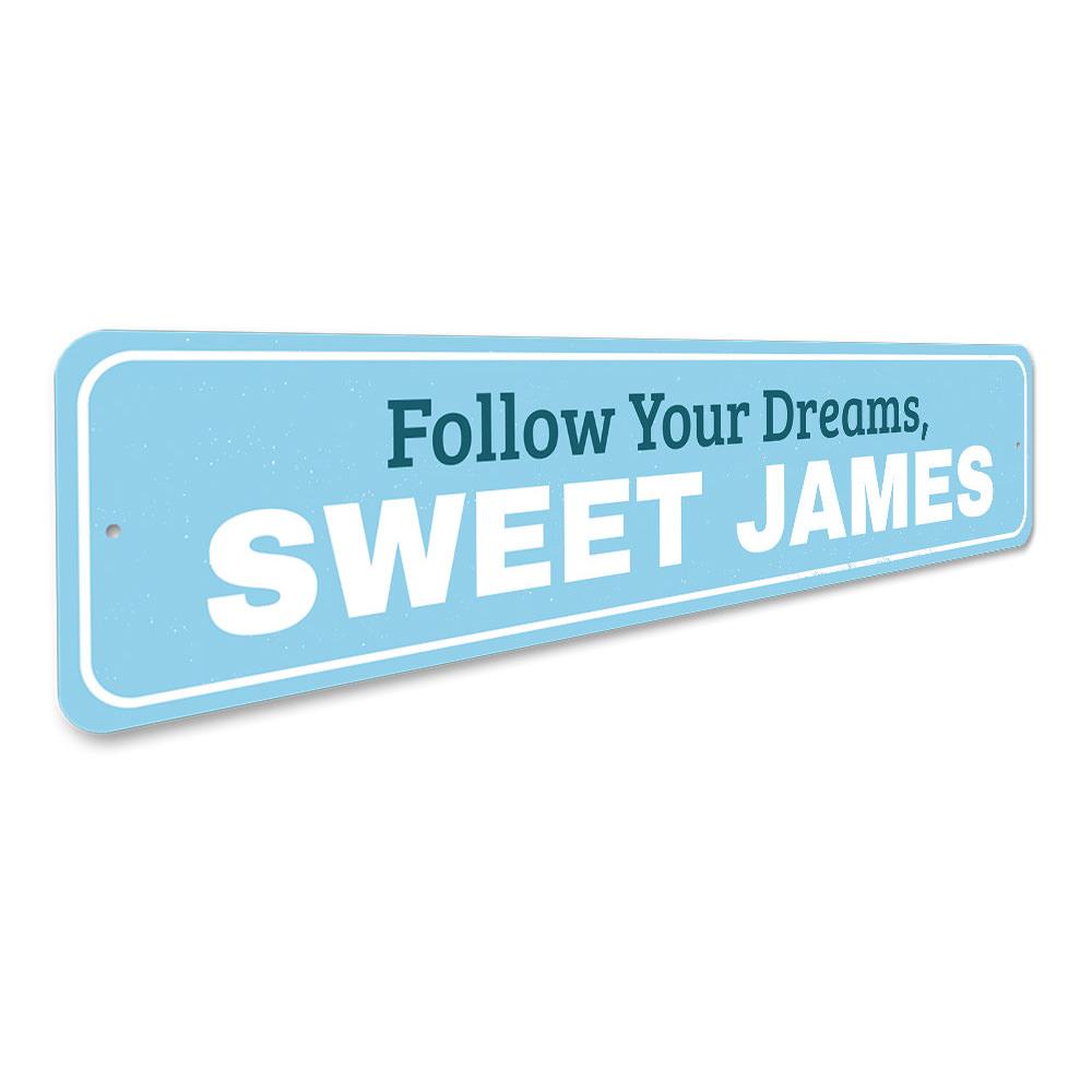 A decorative Follow Your Dreams Sign made of high-quality aluminum, featuring vibrant colors and customizable text, perfect for kids' rooms.