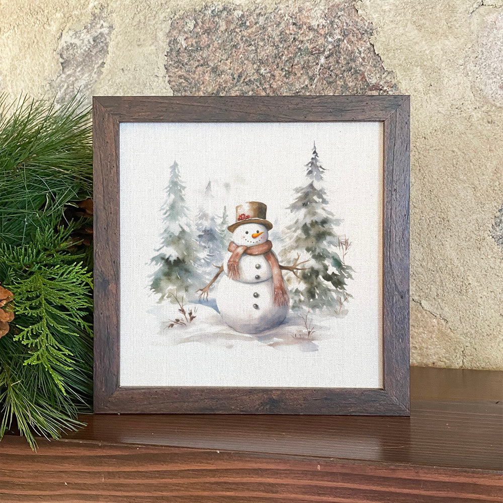 Forest Snowman framed sign with walnut veneer frame and linen-style background, perfect for holiday decor.