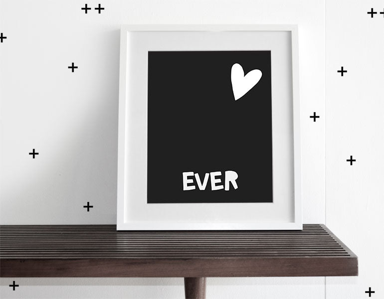 Forever Love Wall Art featuring a heart symbol and heartfelt words, designed for modern nurseries.