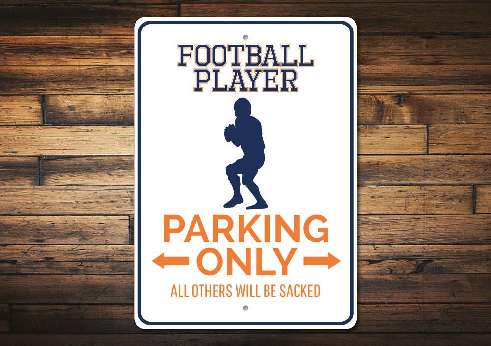 Football Player Parking Sign made of durable aluminum, featuring customizable text and pre-drilled holes for easy mounting.